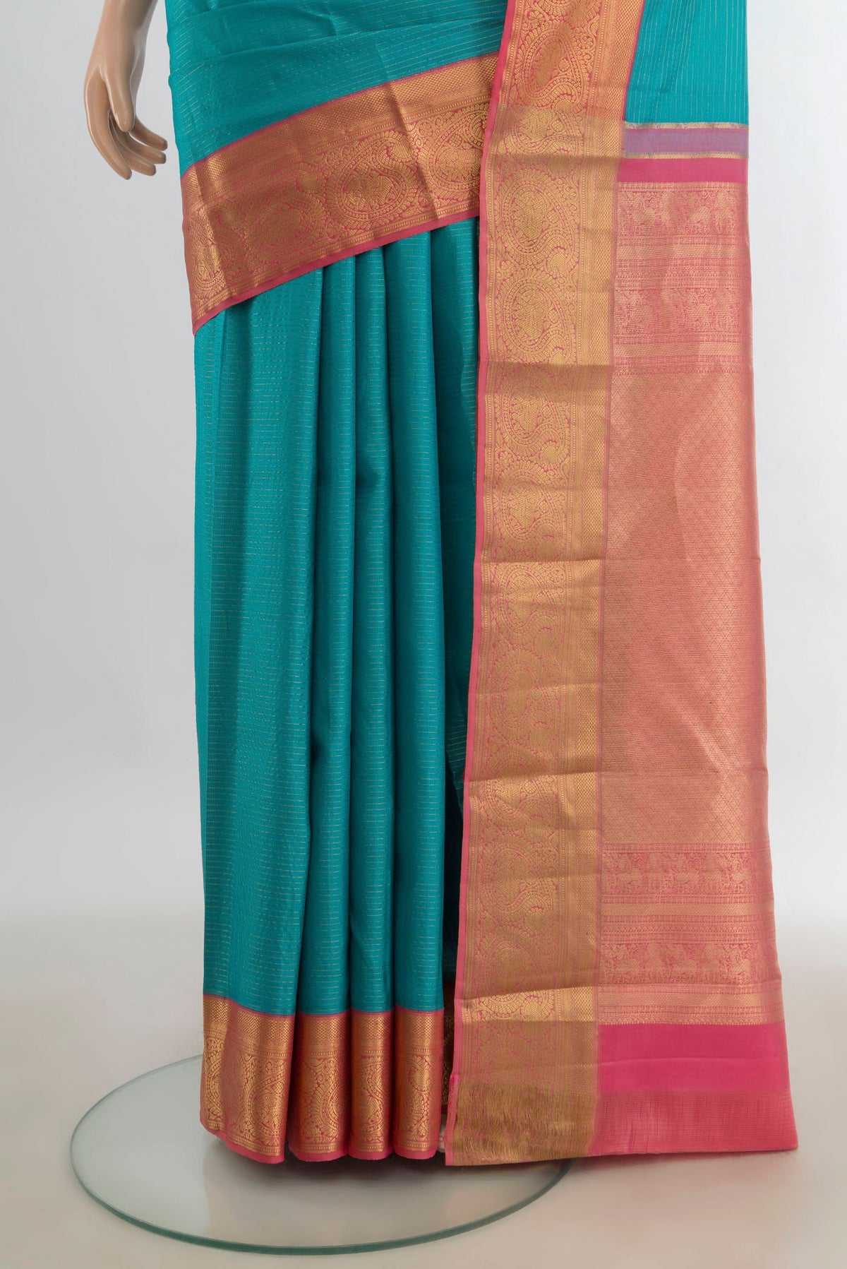 Pleats and pallu of Pure Silk Light Blue Kanjivaram Saree with Zari Butta on the body and Silk Border. 