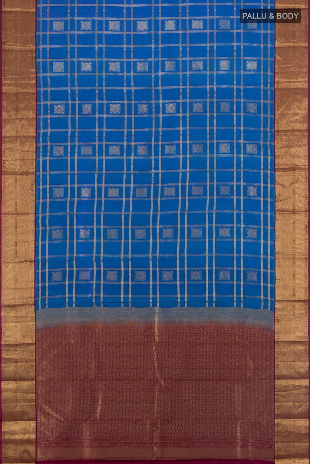 Flat view of Pure Silk Blue Kanchipuram Saree with Checked design on the body and Zari Border. 