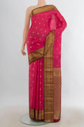 Pure Silk Pink Kanjivaram Saree with Zari Butta on the body and Zari Border.  displayed on a mannequin
