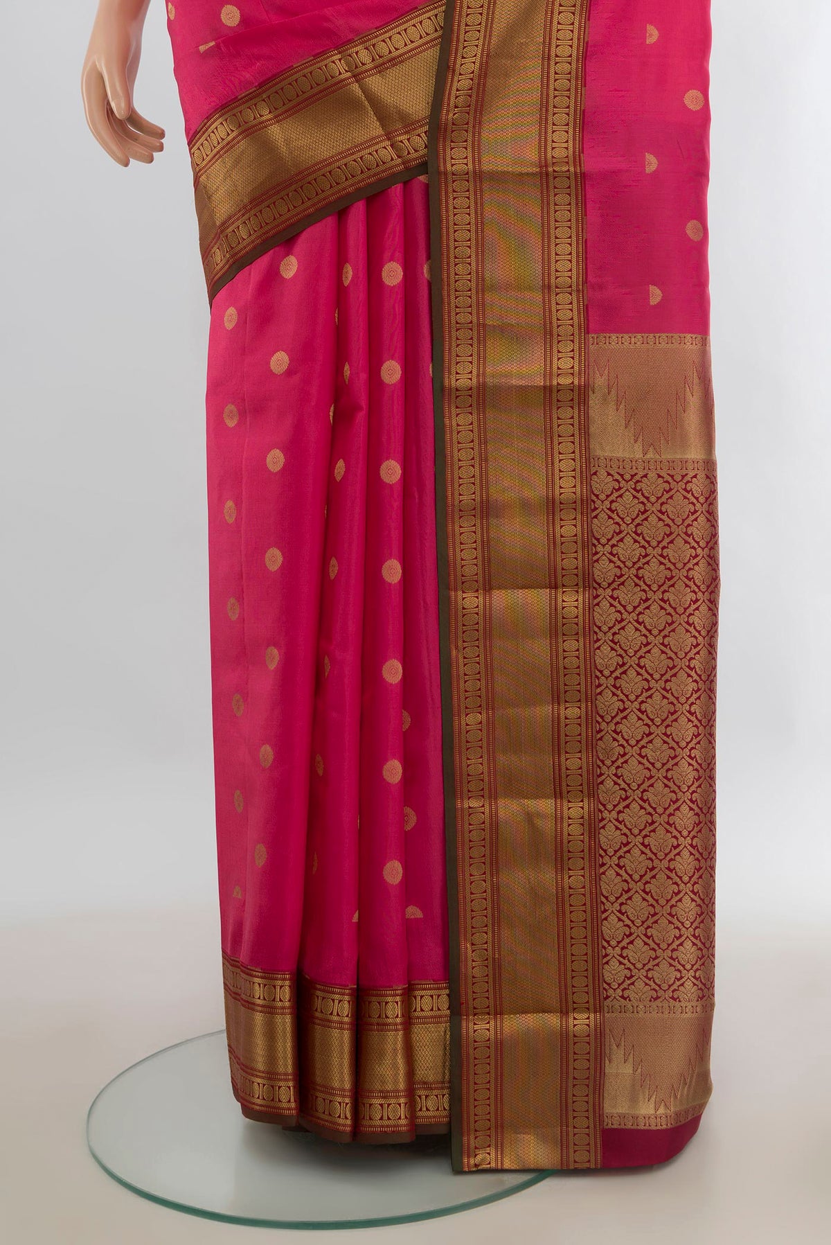 Pleats and pallu of Pure Silk Pink Kanjivaram Saree with Zari Butta on the body and Zari Border. 