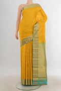 Pure Silk Yellow Kanchipuram Saree with Checked design on the body and Zari Border.  displayed on a mannequin