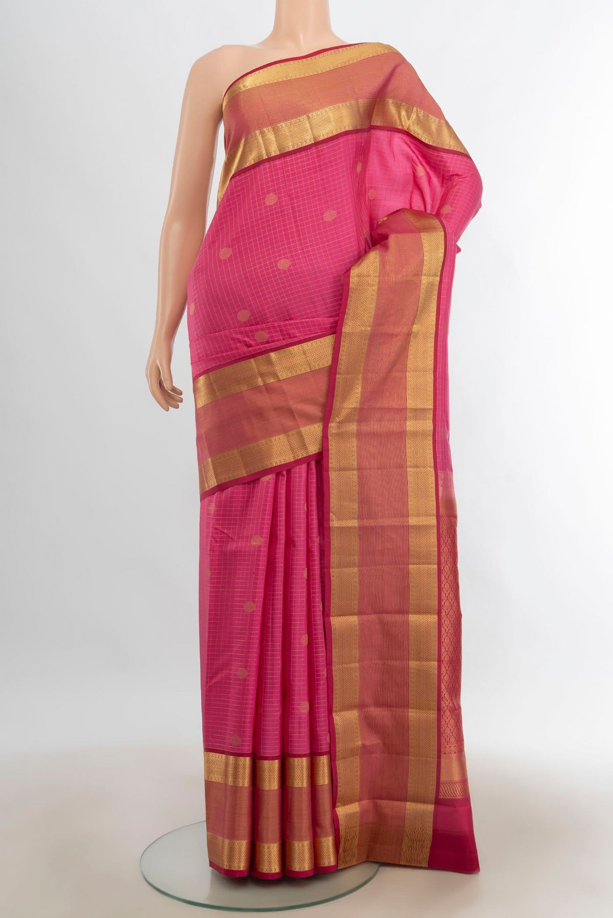 Pure Silk Rose pink Kanchipuram Saree with Zari Butta on the body and Silk Border.  displayed on a mannequin