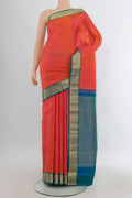 Pure Silk Brick Orange Kanjivaram Saree with Zari Butta on the body and Zari Border.  displayed on a mannequin