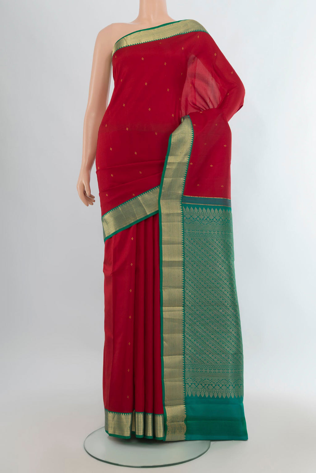 Pure Silk Red Kanjivaram Saree with Zari Butta on the body and Zari Border.  displayed on a mannequin