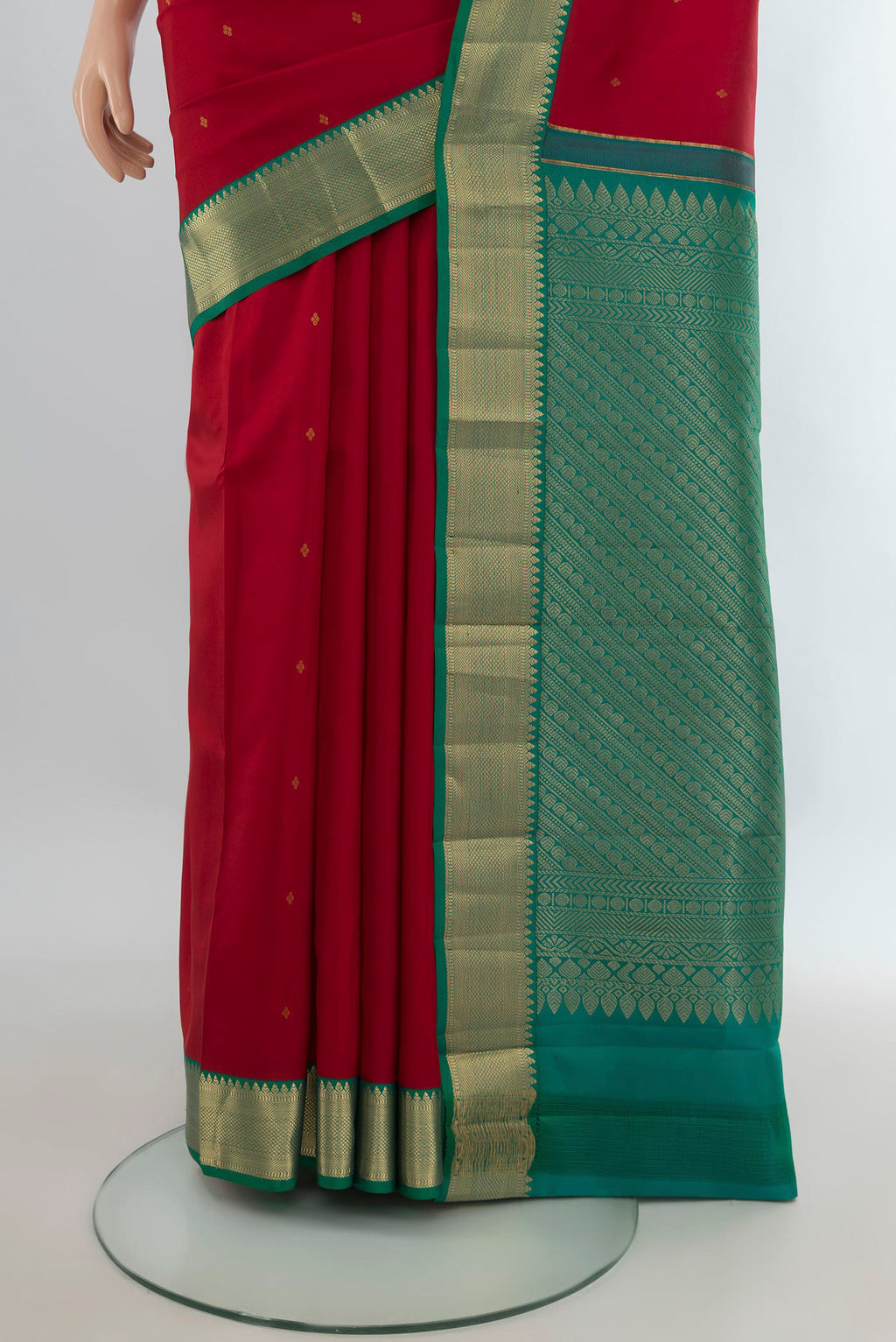 Pleats and pallu of Pure Silk Red Kanjivaram Saree with Zari Butta on the body and Zari Border. 