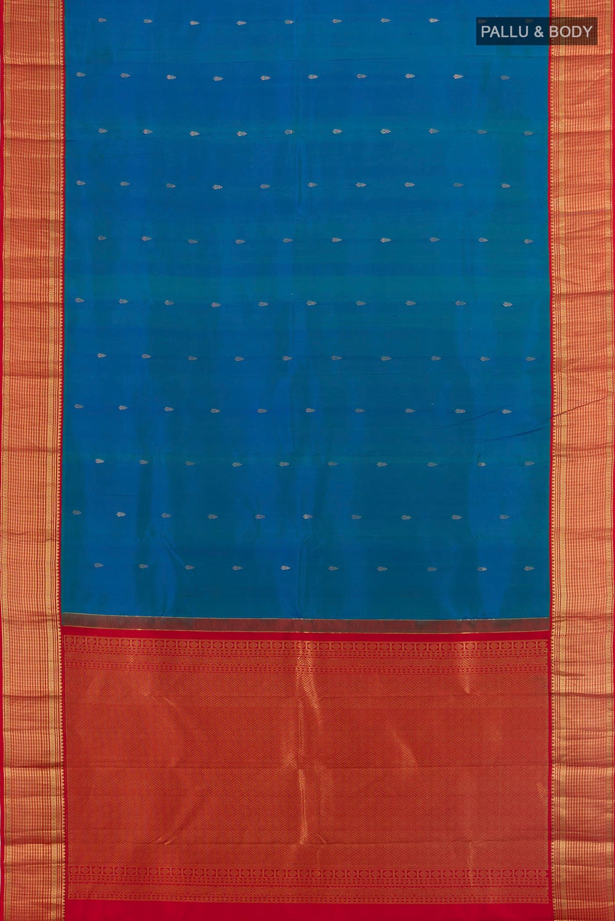 Flat view of Pure Silk Peacock Blue Kanchipuram Saree with Zari Butta on the body and Zari Border. 