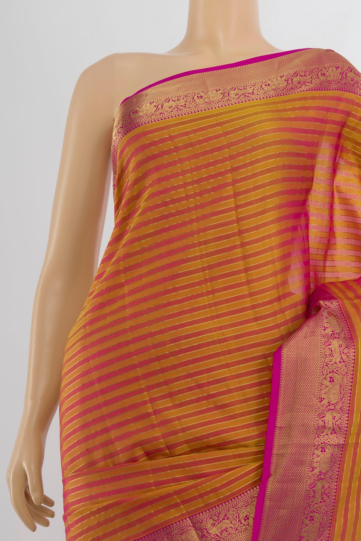 Border image of Pure Silk Golden Peach Kanjivaram Saree with Zari Butta on the body and Silk Border. 