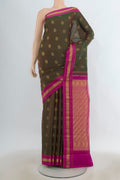 Pure Silk Mehandi Green Kanchipuram Saree with Zari Butta on the body and Zari Border.  displayed on a mannequin