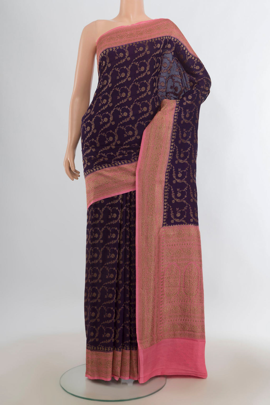 Violet Banarasi Georgette Saree with Zari Butta on the body and Zari Border.  displayed on a mannequin