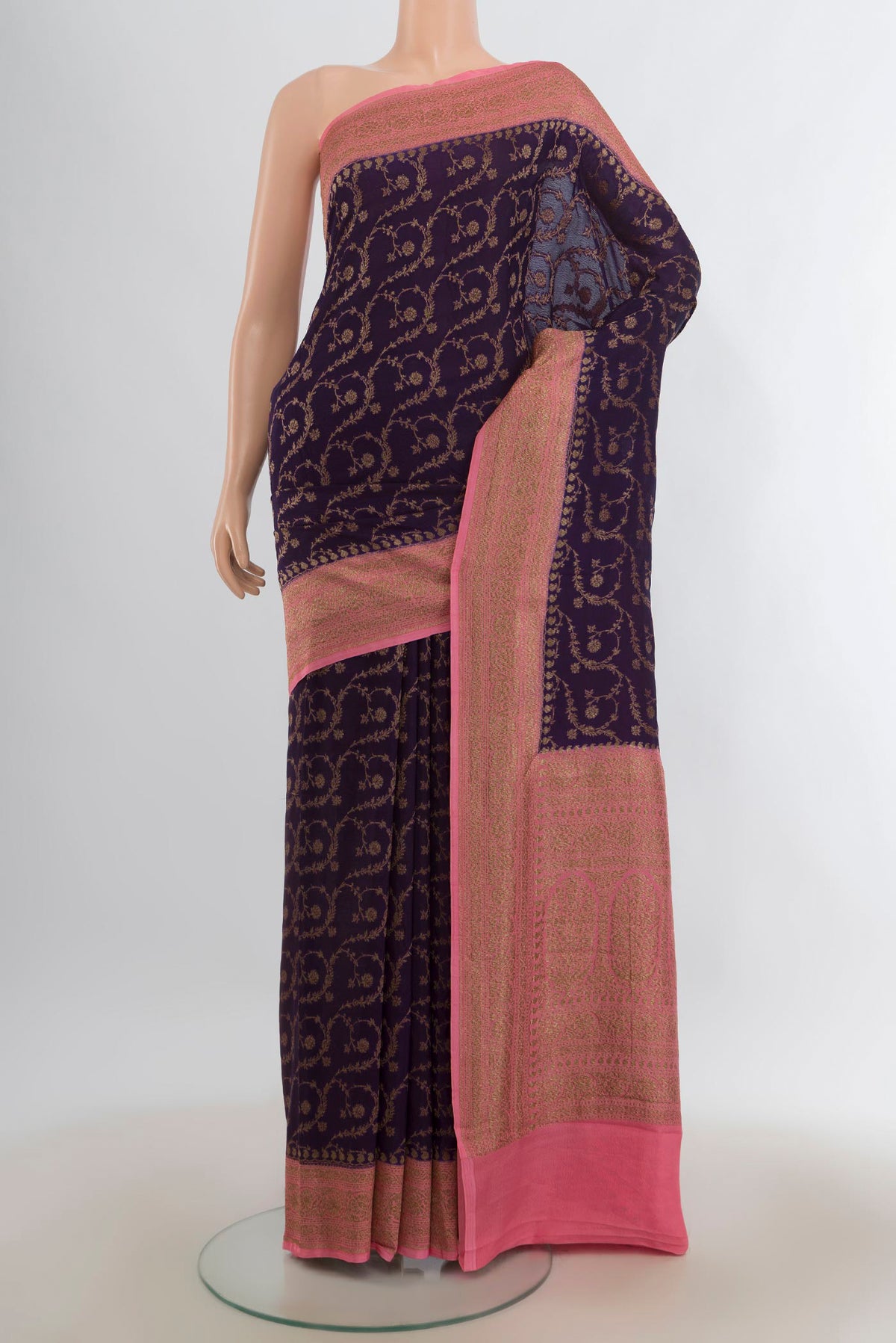 Violet Banarasi Georgette Saree with Zari Butta on the body and Zari Border.  displayed on a mannequin