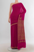 Purple Banarasi Georgette Saree with Zari Butta on the body and Silk Border.  displayed on a mannequin