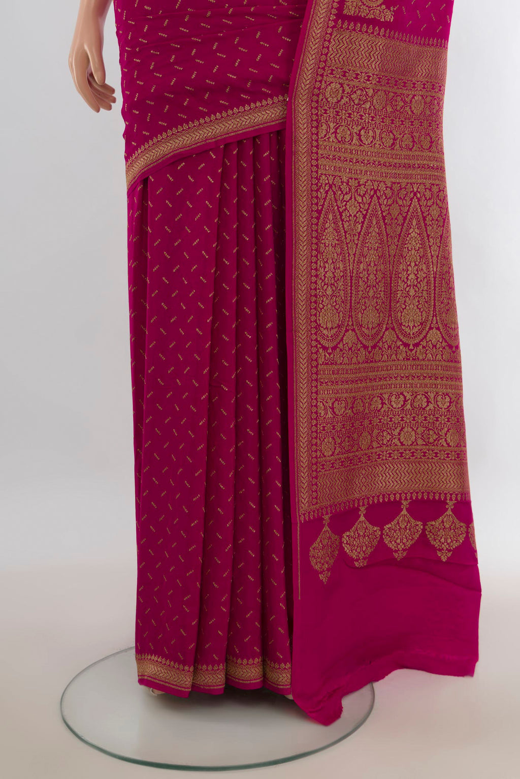 Pleats and pallu of Purple Banarasi Georgette Saree with Zari Butta on the body and Silk Border. 