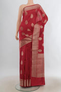 Pure Silk Red Banarasi Raw Saree with Zari Butta on the body and Zari Border.  displayed on a mannequin
