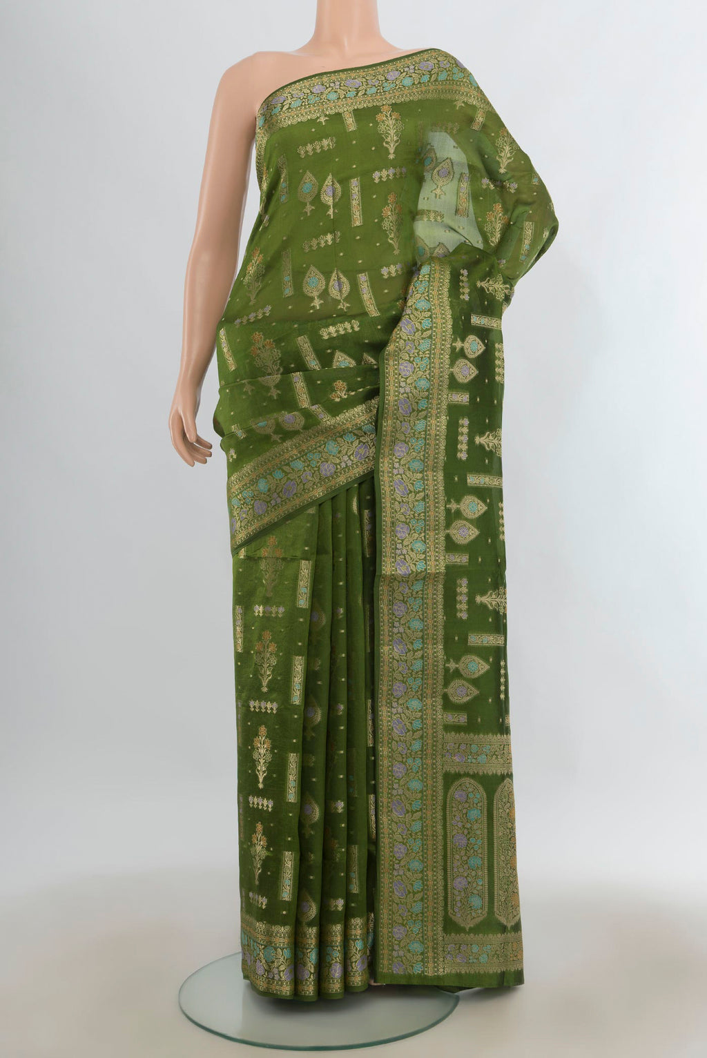 Pure Silk Green Banarasi Raw Saree with Zari Butta on the body and Zari Border.  displayed on a mannequin