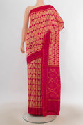 Pure Silk Peach Pochampally Saree with Pure Ikat on the body and Plain Border.  displayed on a mannequin