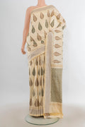 Pure Silk Cream Pochampally Saree with Pure Ikat on the body and Plain Border.  displayed on a mannequin