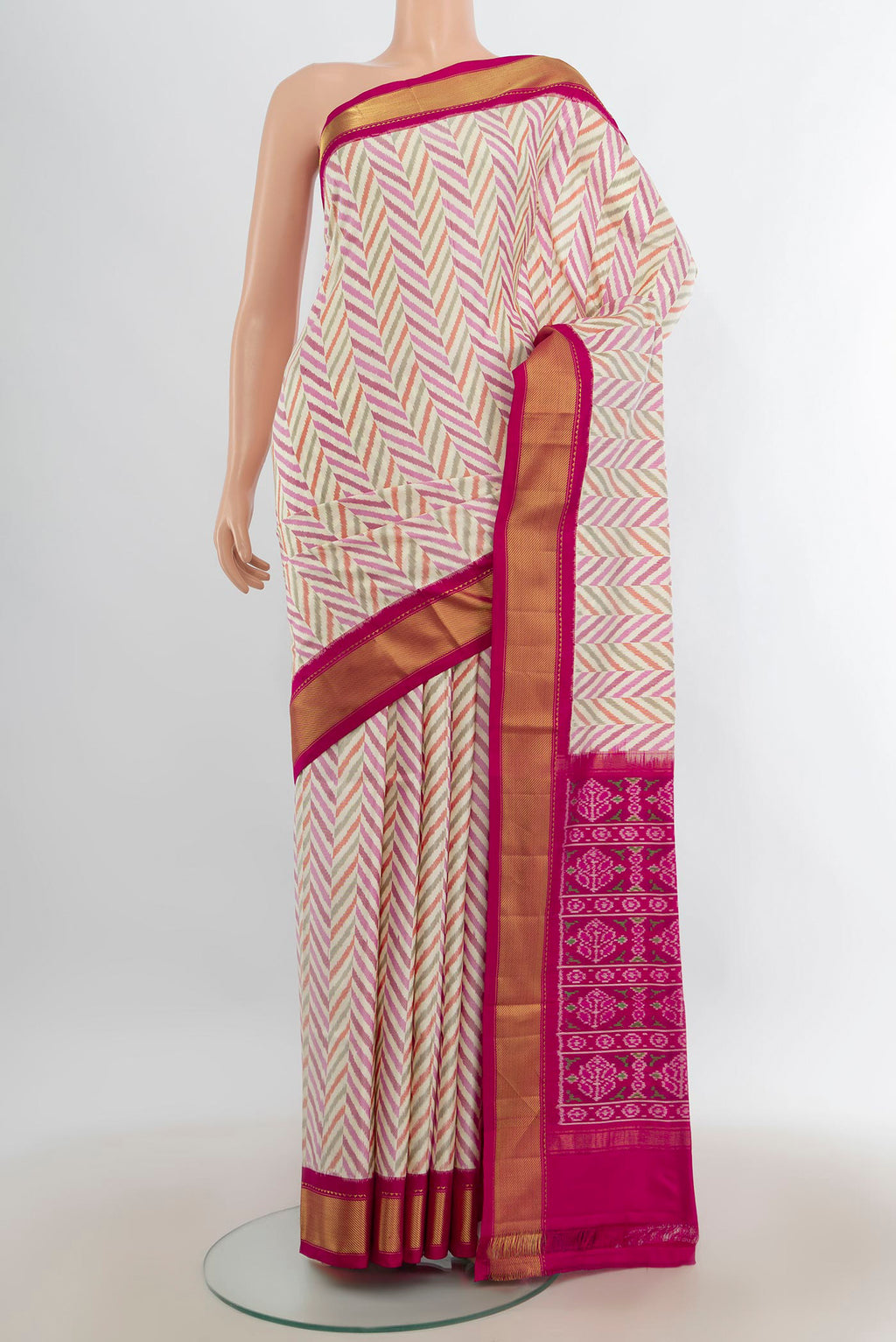 Pure Silk Multi Color Pochampally Saree with Pure Ikat on the body and Zari Border.  displayed on a mannequin