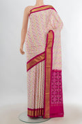 Pure Silk Multi Color Pochampally Saree with Pure Ikat on the body and Zari Border.  displayed on a mannequin