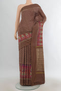 Pure Silk Coffee Brown Pochampally Saree with Pure Ikat on the body and Zari Border.  displayed on a mannequin