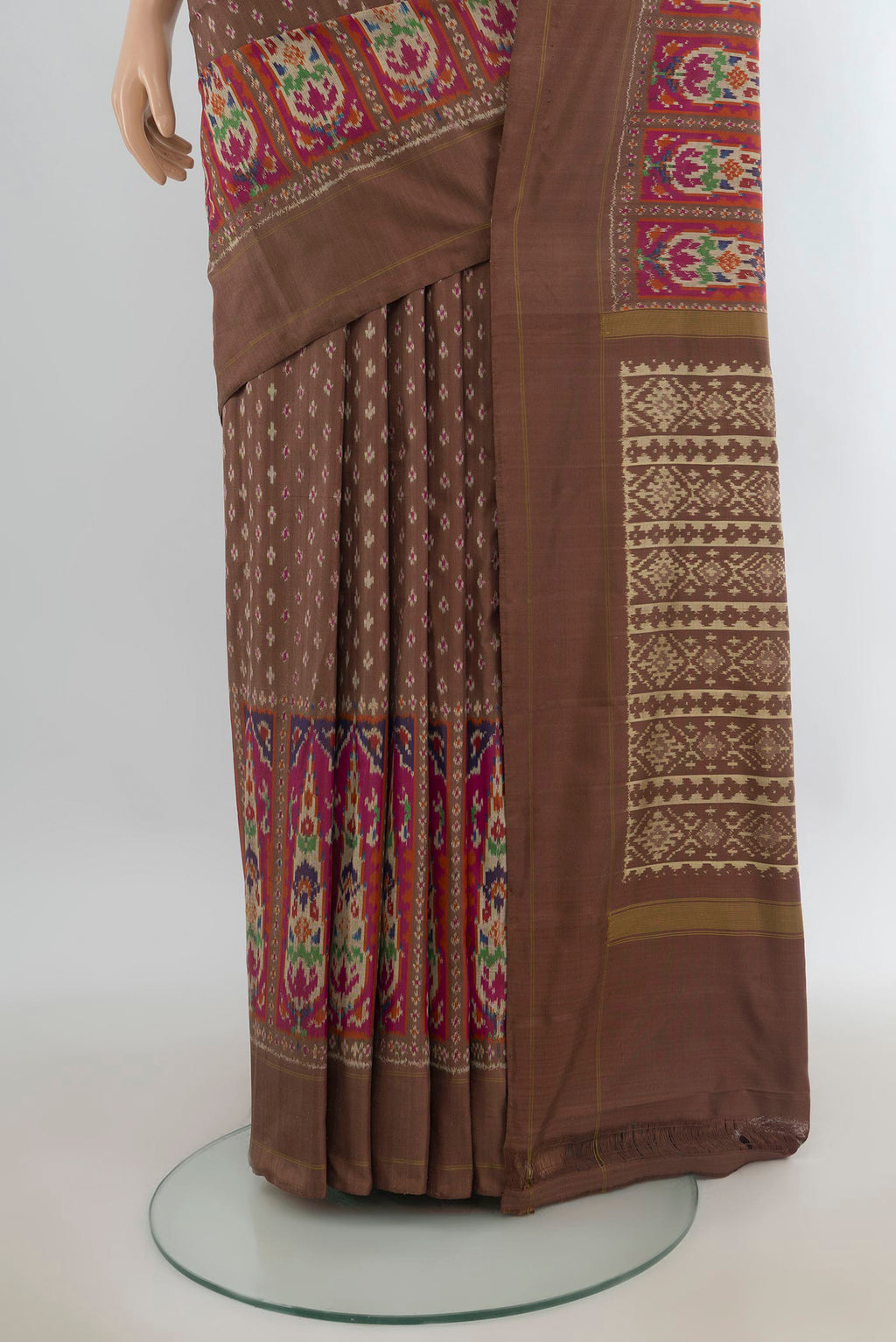 Pleats and pallu of Pure Silk Coffee Brown Pochampally Saree with Pure Ikat on the body and Zari Border. 