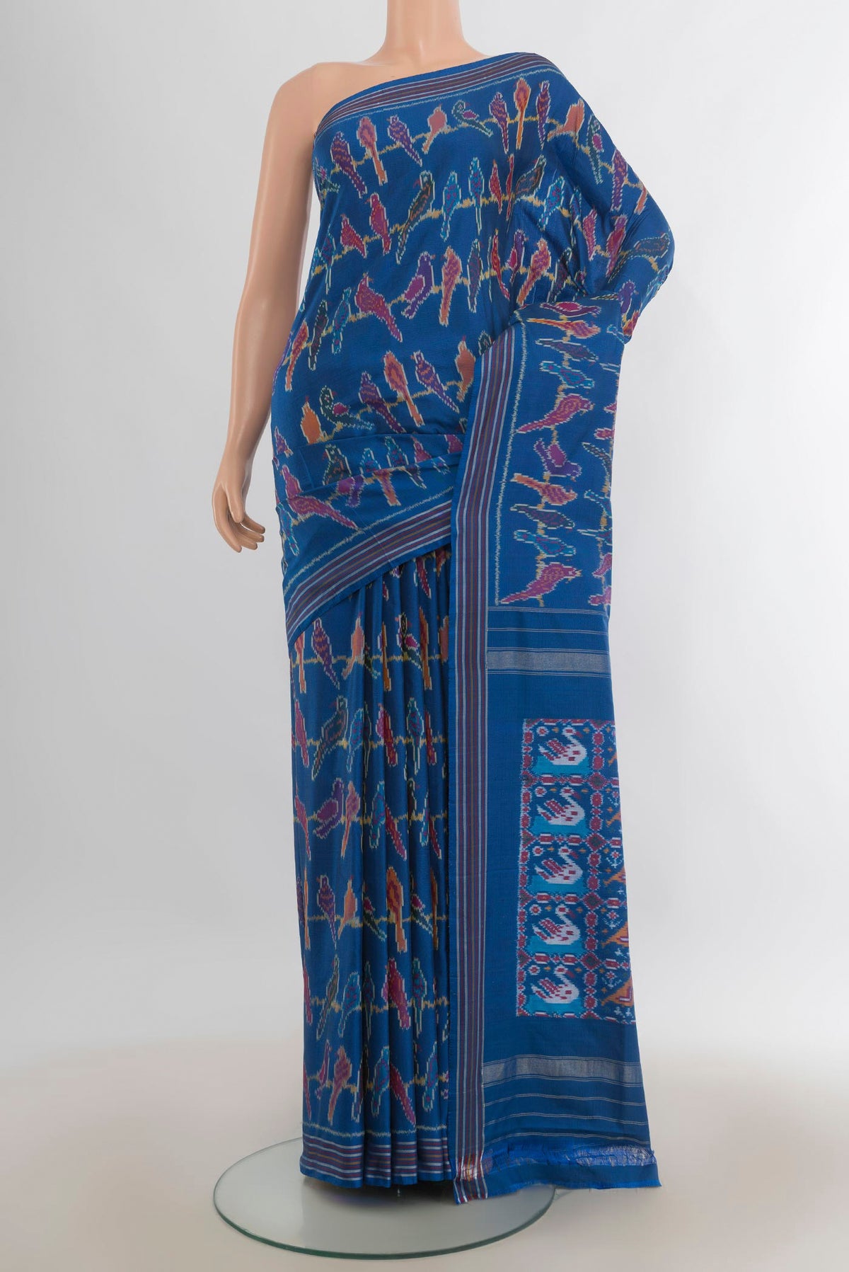 Pure Silk Blue Pochampally Saree with Pure Ikat on the body and Plain Border.  displayed on a mannequin