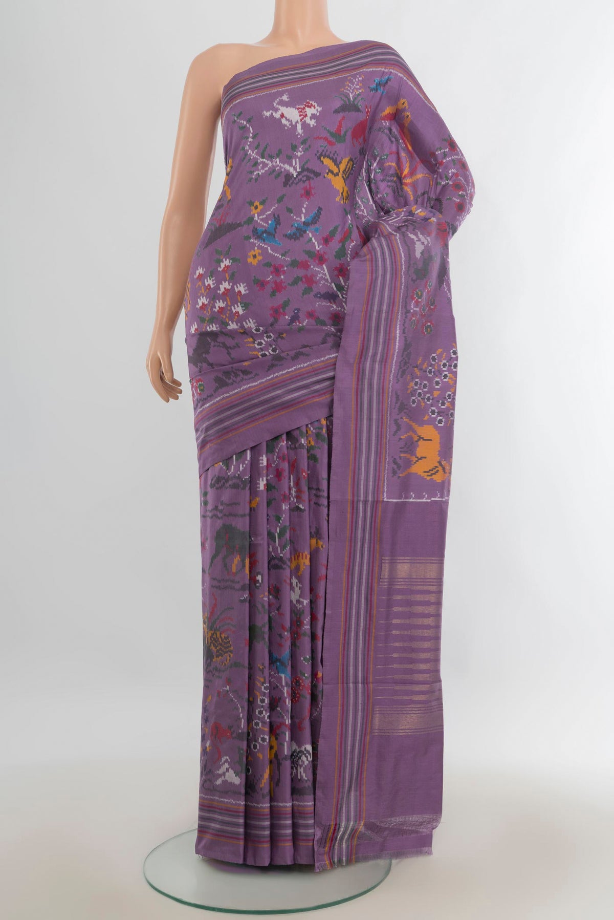 Pure Silk Multi Color Rajkot Patola Saree with Ikat Print on the body and Silk Border.  displayed on a mannequin