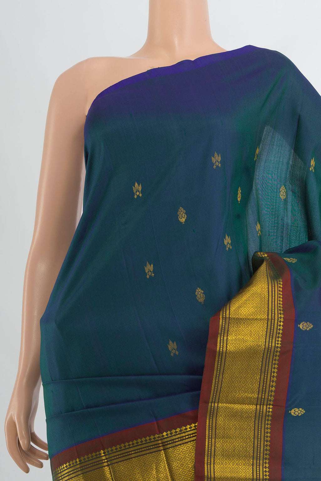 Border image of Pure Silk Peacock Blue Kanjivaram Saree with Zari Butta on the body and Silk Border. 