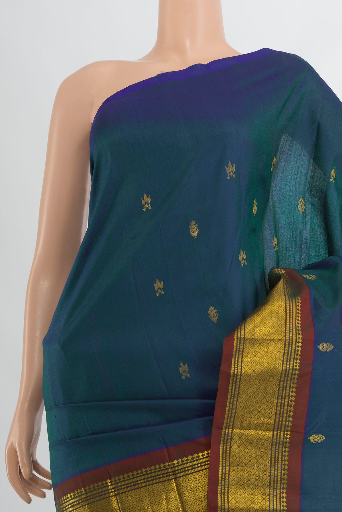 Border image of Pure Silk Peacock Blue Kanjivaram Saree with Zari Butta on the body and Silk Border. 