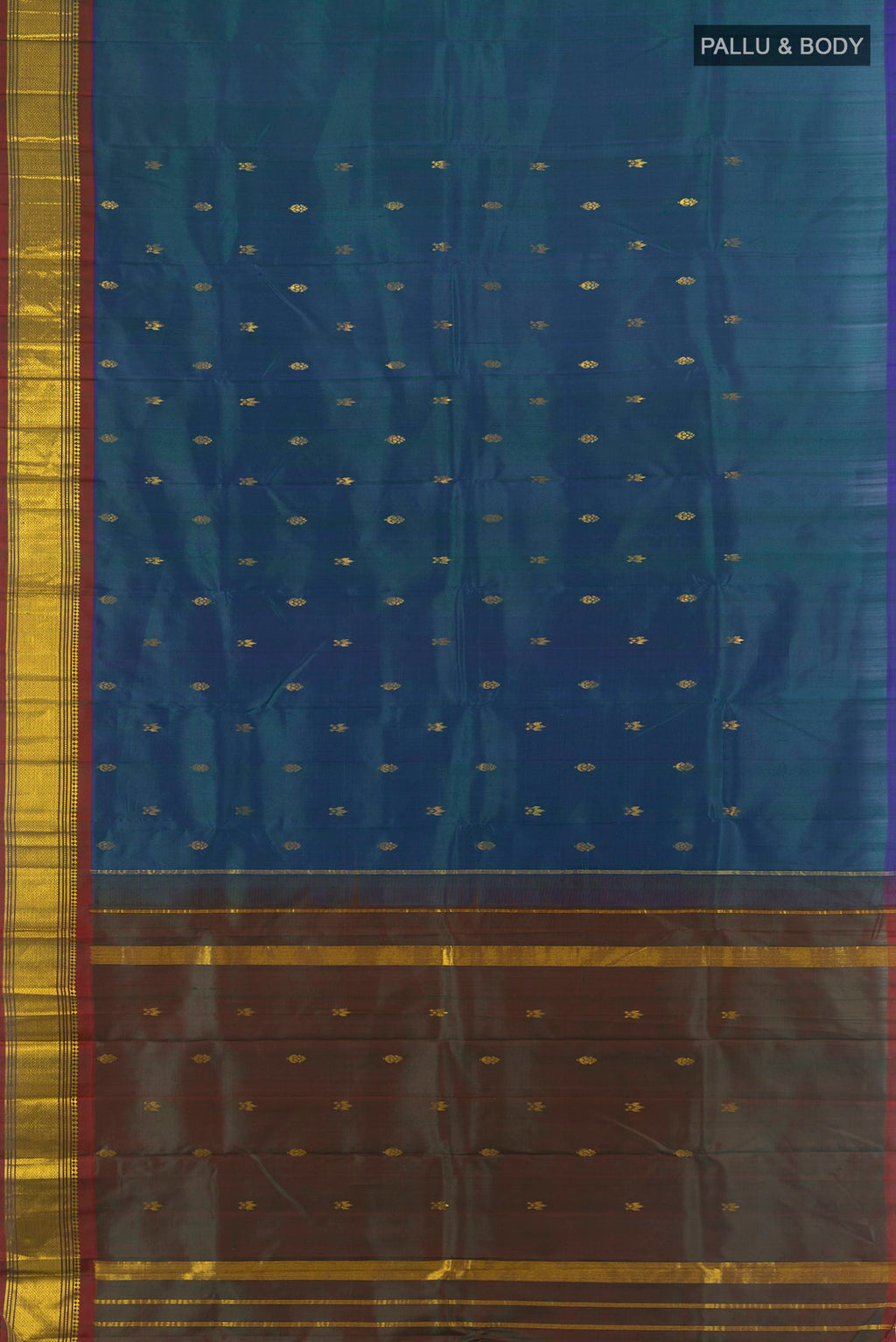 Flat view of Pure Silk Peacock Blue Kanjivaram Saree with Zari Butta on the body and Silk Border. 