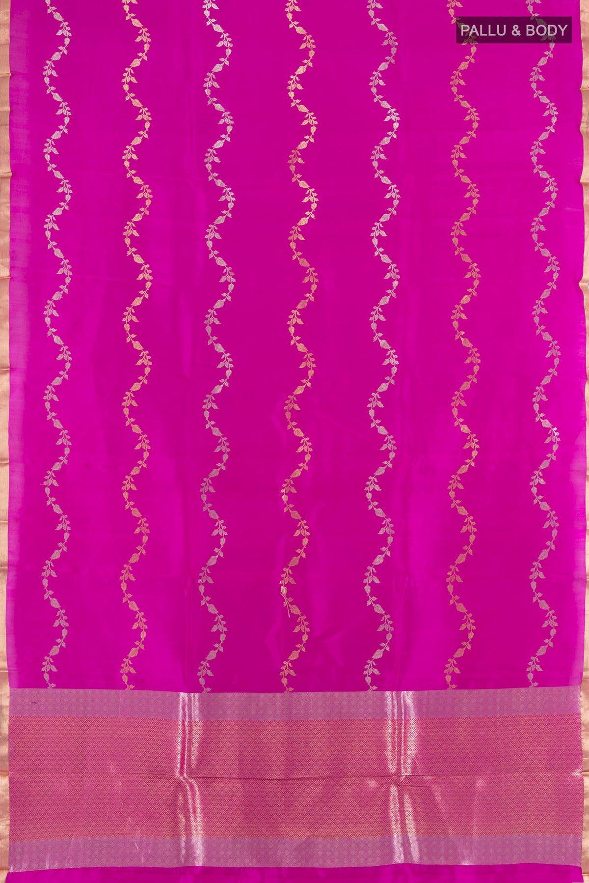 Flat view of Pure Silk Rani Pink Banarasi Katan Saree with Zari Butta on the body and Zari Border. 