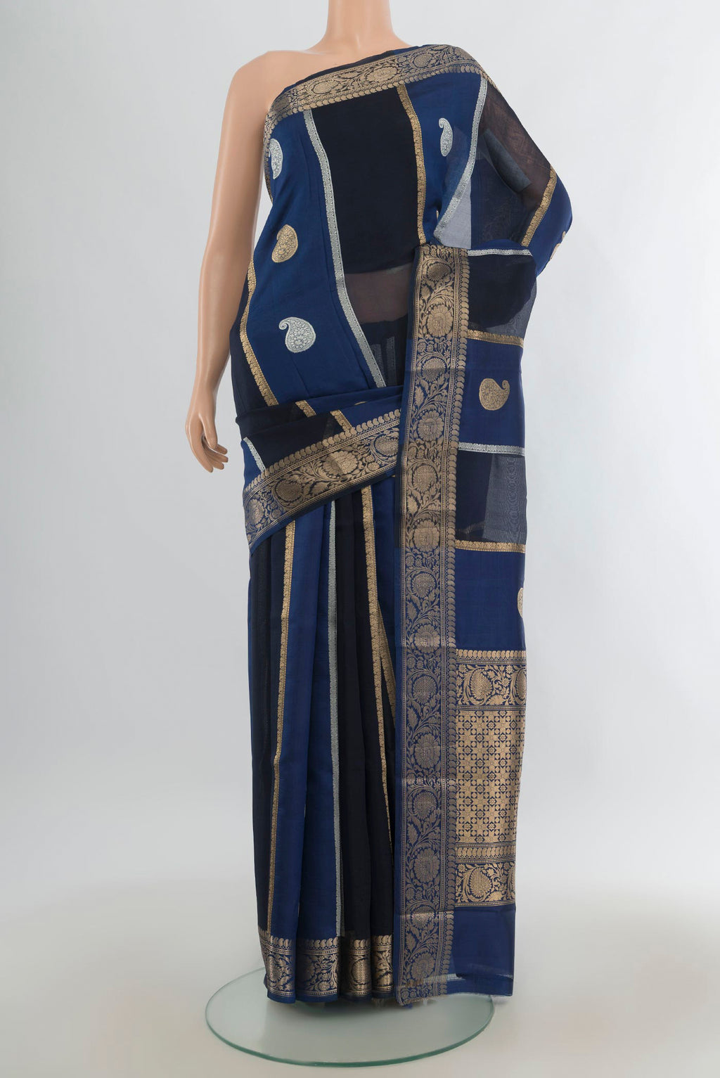 Pure Silk Blue Banarasi Katan Saree with Zari Butta on the body and Zari Border.  displayed on a mannequin
