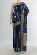 Pure Silk Blue Banarasi Katan Saree with Zari Butta on the body and Zari Border.  displayed on a mannequin