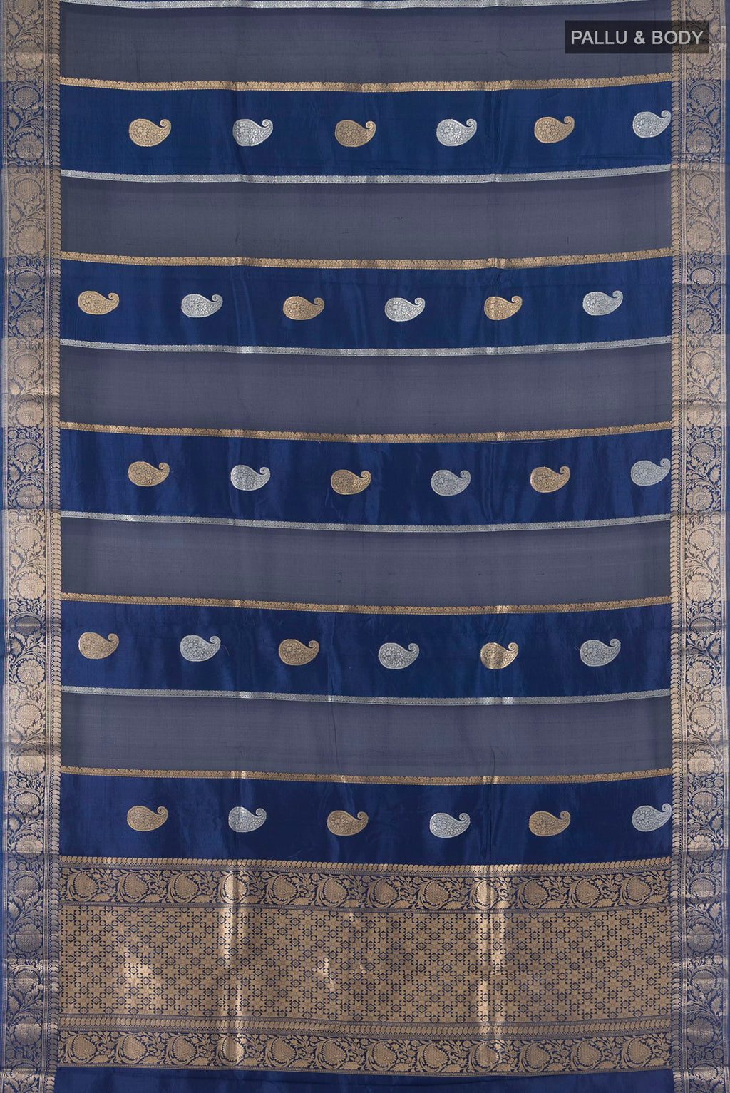 Flat view of Pure Silk Blue Banarasi Katan Saree with Zari Butta on the body and Zari Border. 