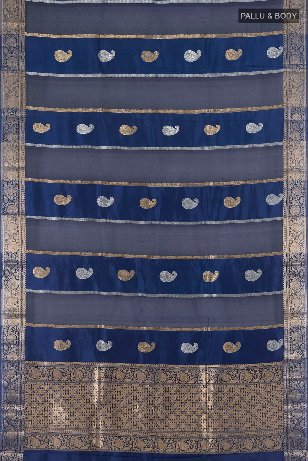 Flat view of Pure Silk Blue Banarasi Katan Saree with Zari Butta on the body and Zari Border. 