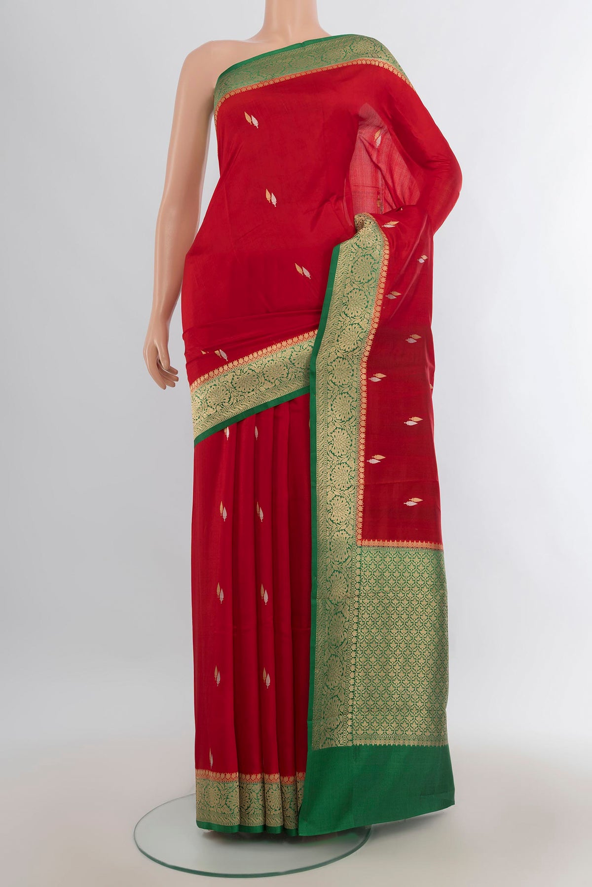 Pure Silk Red Banarasi Katan Saree with Zari Butta on the body and Silk Border.  displayed on a mannequin