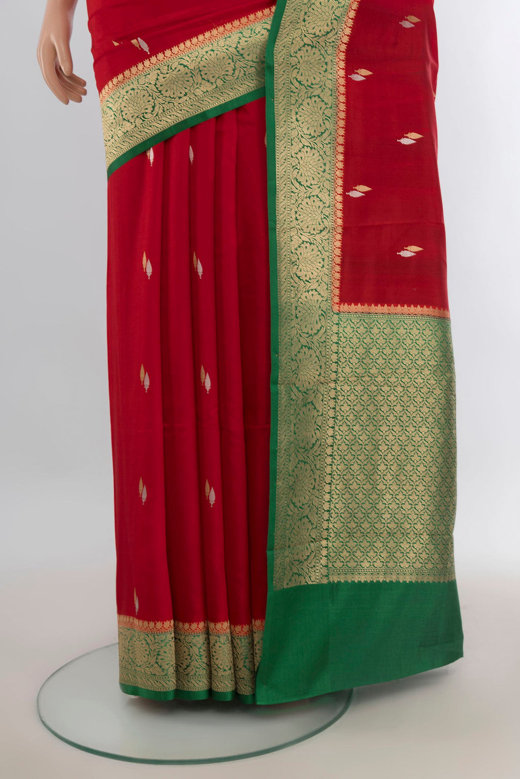 Pleats and pallu of Pure Silk Red Banarasi Katan Saree with Zari Butta on the body and Silk Border. 