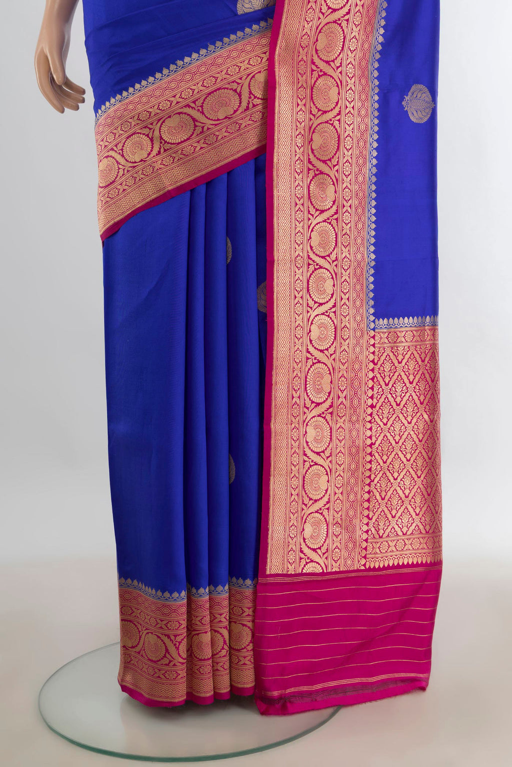 Pleats and pallu of Pure Silk Dark Blue Banarasi Katan Saree with Zari Butta on the body and Silk Border. 