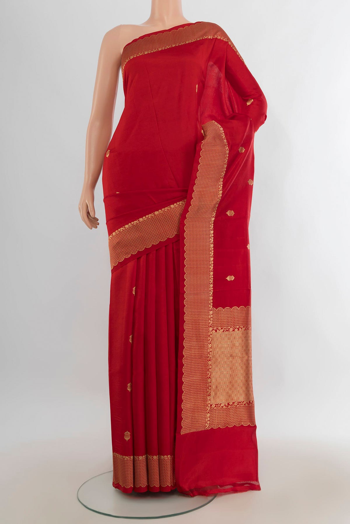 Pure Silk Red Banarasi Katan Saree with Zari Butta on the body and Silk Border.  displayed on a mannequin