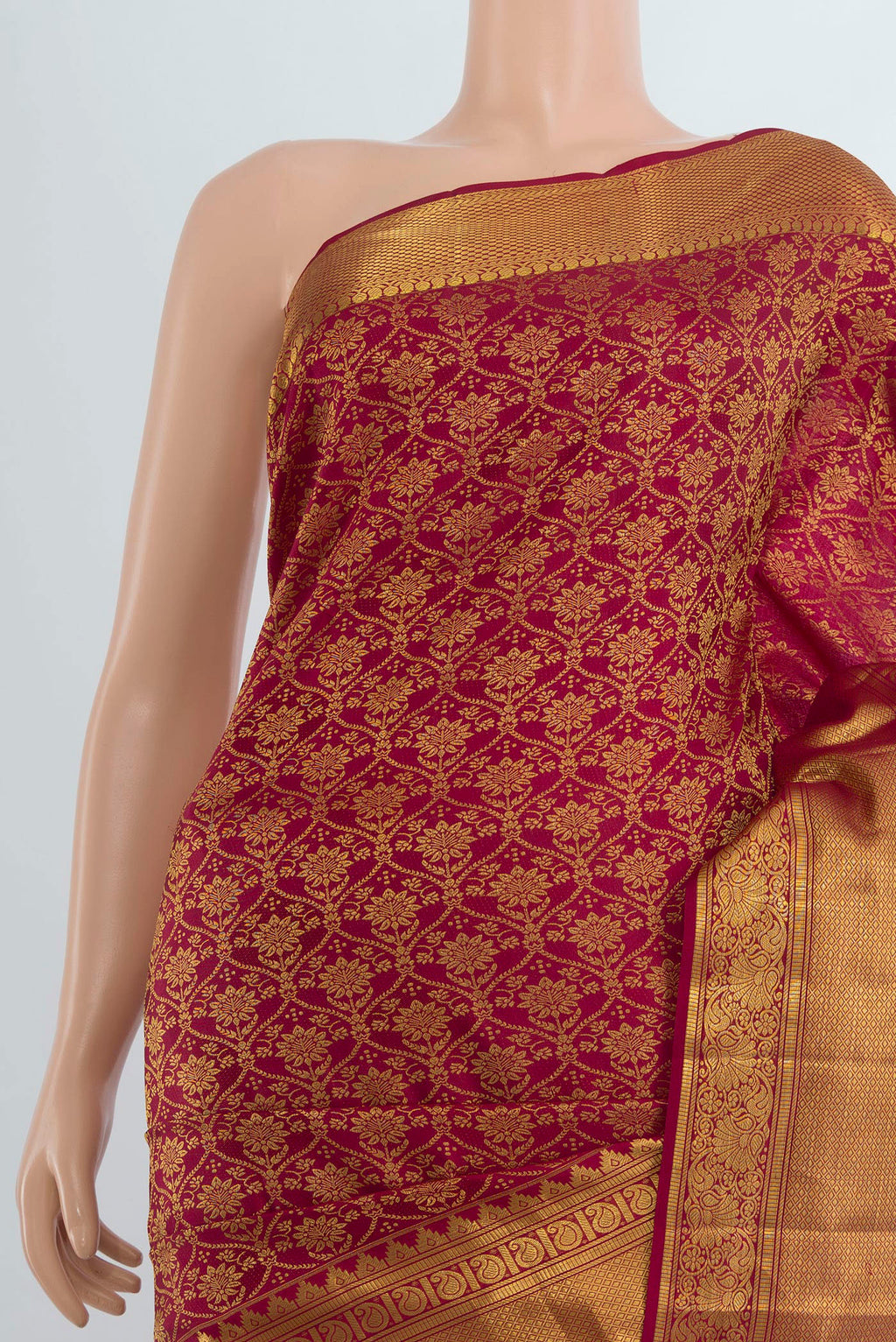 Border image of Pure Silk Maroon Kanchipuram Saree with Zari Butta on the body and Silk Border. 