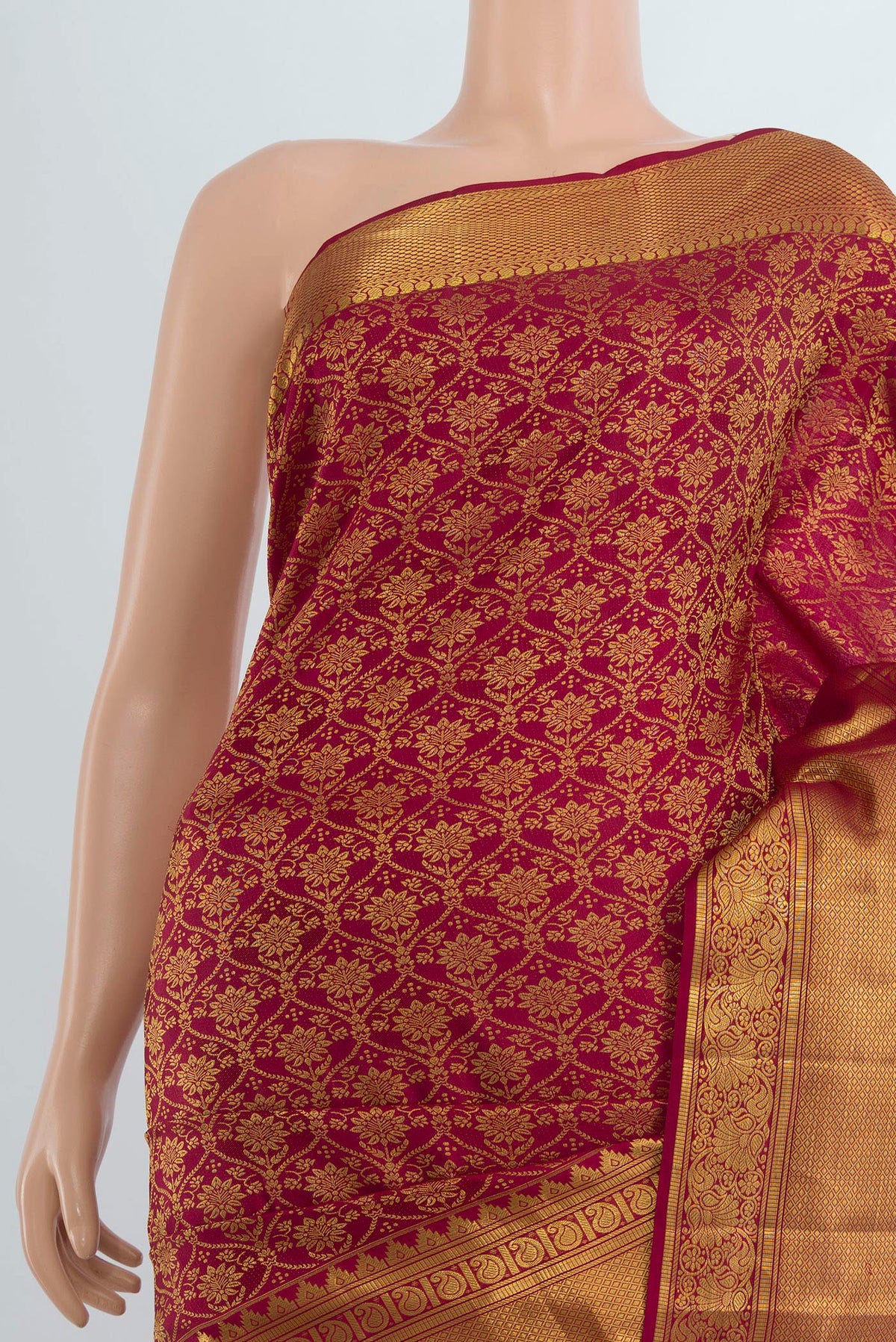 Border image of Pure Silk Maroon Kanchipuram Saree with Zari Butta on the body and Silk Border. 
