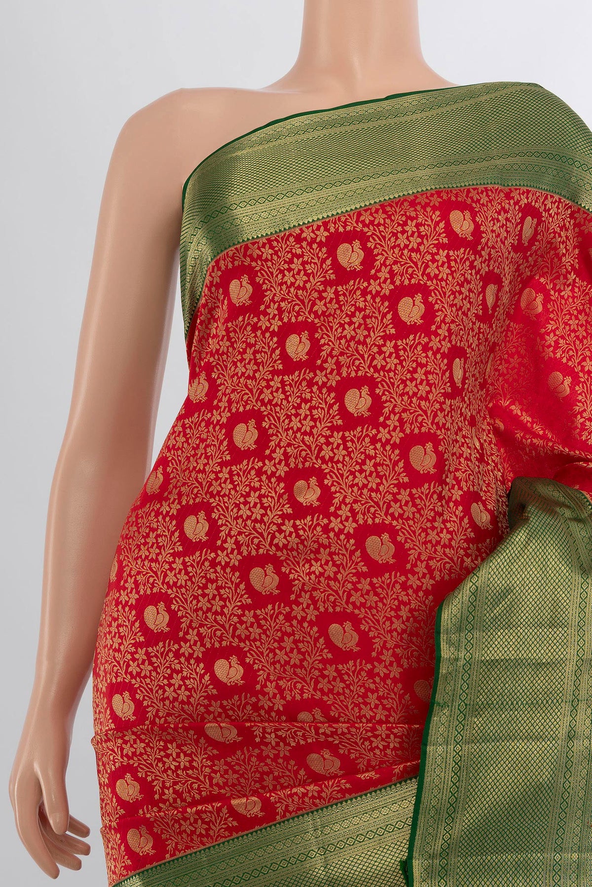 Border image of Pure Silk Red Kanjivaram Saree with Zari Butta on the body and Silk Border. 