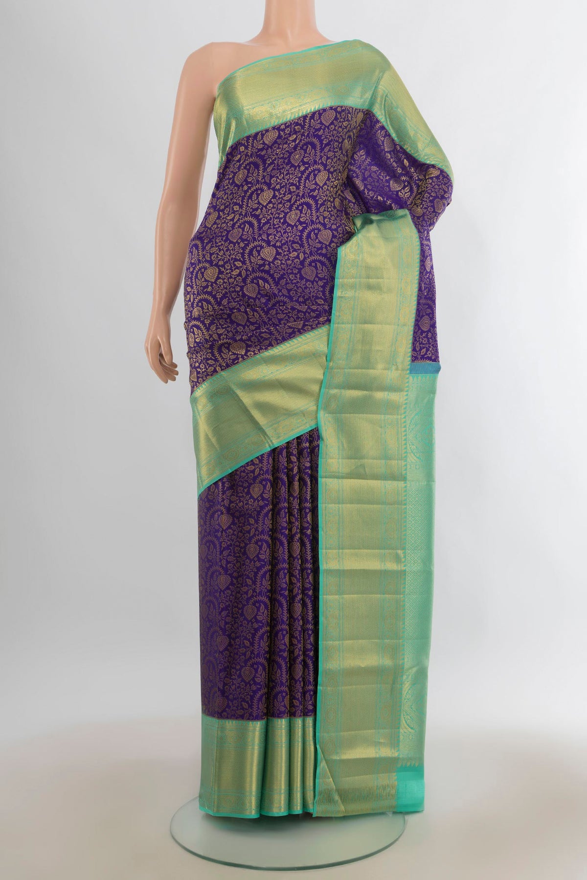Pure Silk Dark Blue Kanjivaram Saree with Zari Brocade on the body and Zari Border.  displayed on a mannequin