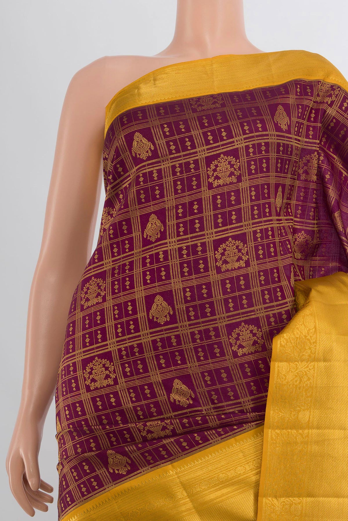 Border image of Pure Silk Maroon Kanjivaram Saree with Zari Butta on the body and Silk Border. 