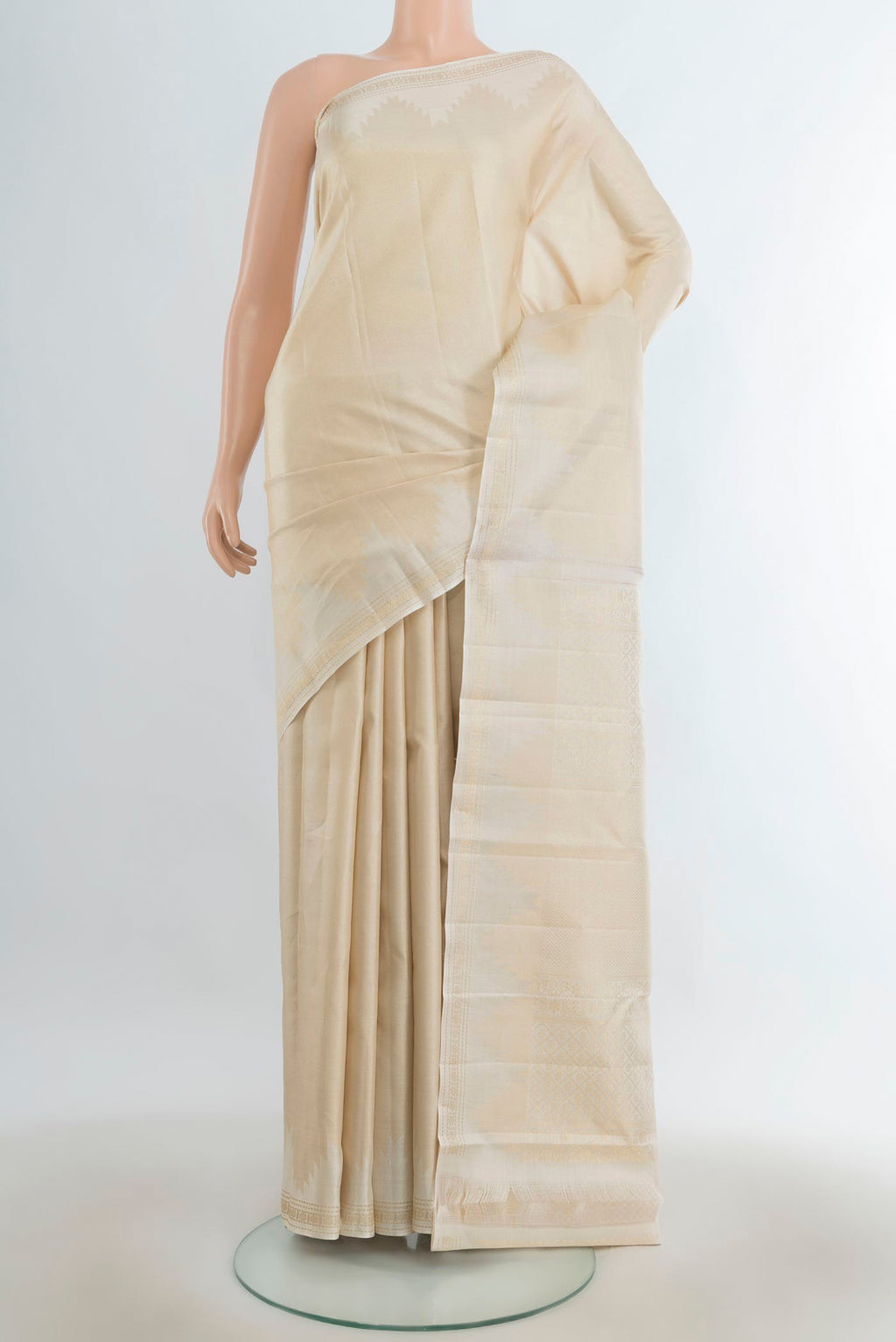 Pure Silk Golden Kanchipuram Saree with Plain Body and Silk Border.  displayed on a mannequin