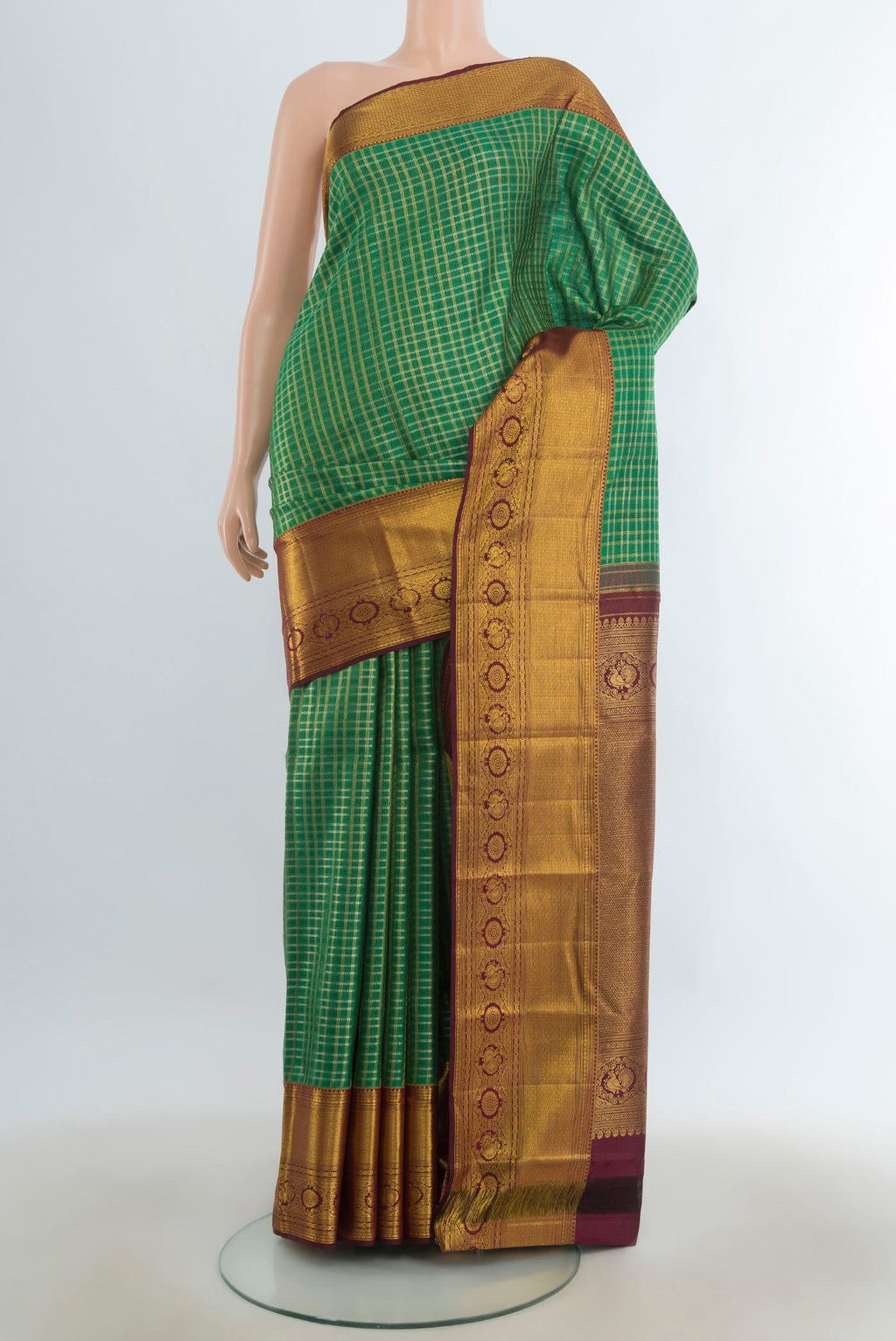 Pure Silk Multi Color Kanjivaram Saree with Checked design on the body and Silk Border.  displayed on a mannequin