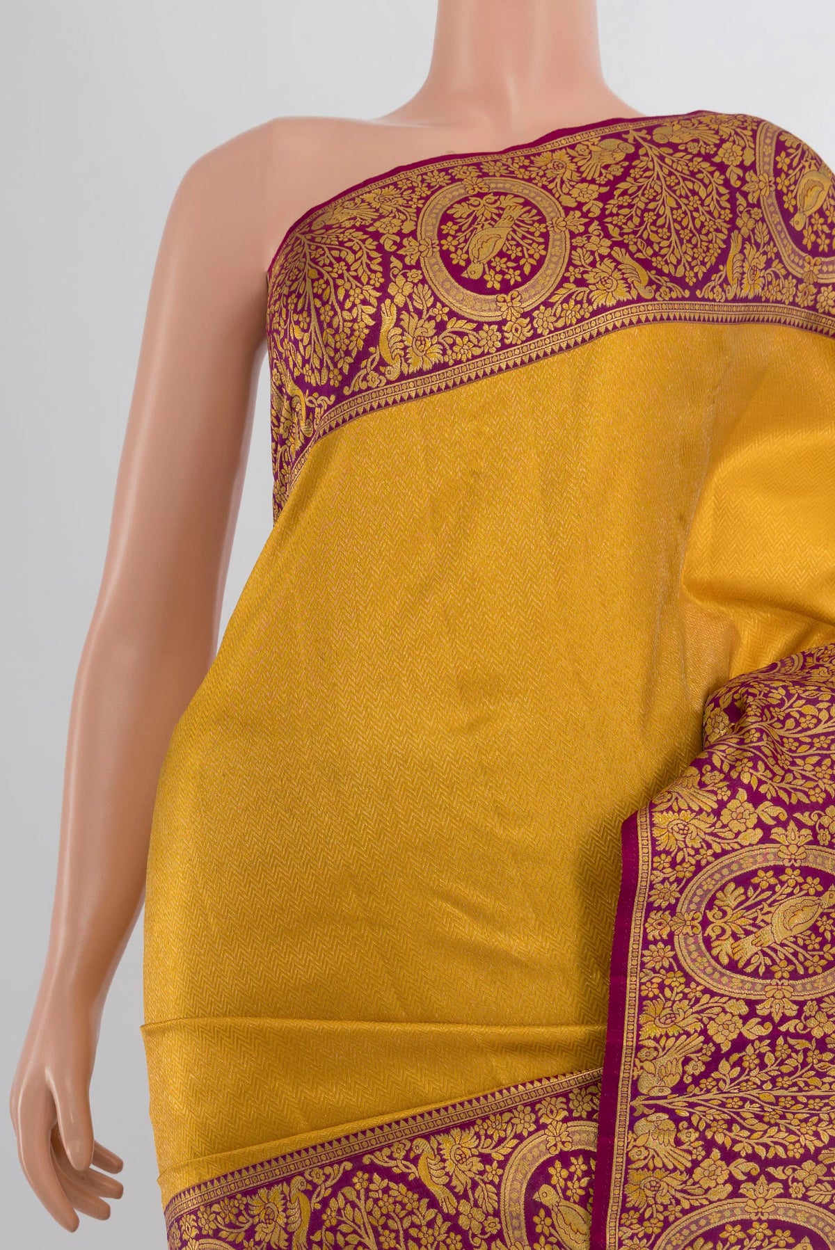 Border image of Pure Silk Yellow Kanjivaram Saree with Zari Butta on the body and Silk Border. 