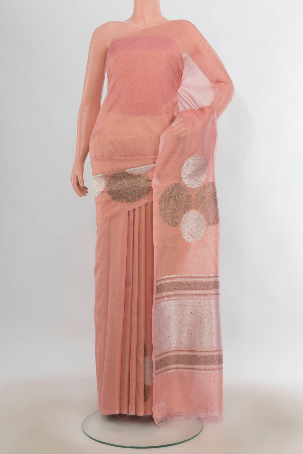 Pure Silk Peach Tussar Saree with Fancy on the body and Without Border.  displayed on a mannequin