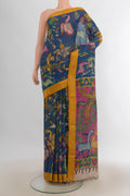 Pure Silk Blue kalamkari Saree with Floral Print on the body and Zari Border.  displayed on a mannequin