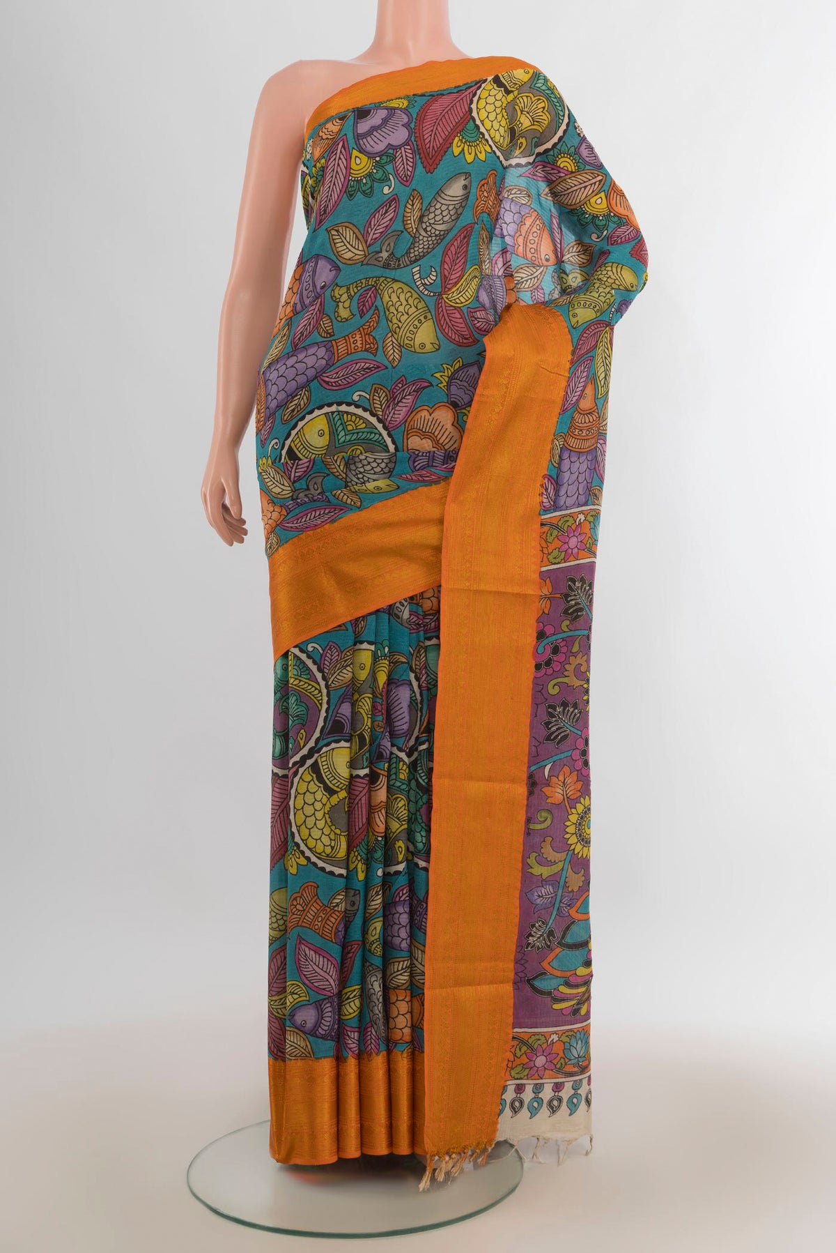 Pure Silk Green kalamkari Saree with kalamkari Print on the body and Zari Border.  displayed on a mannequin