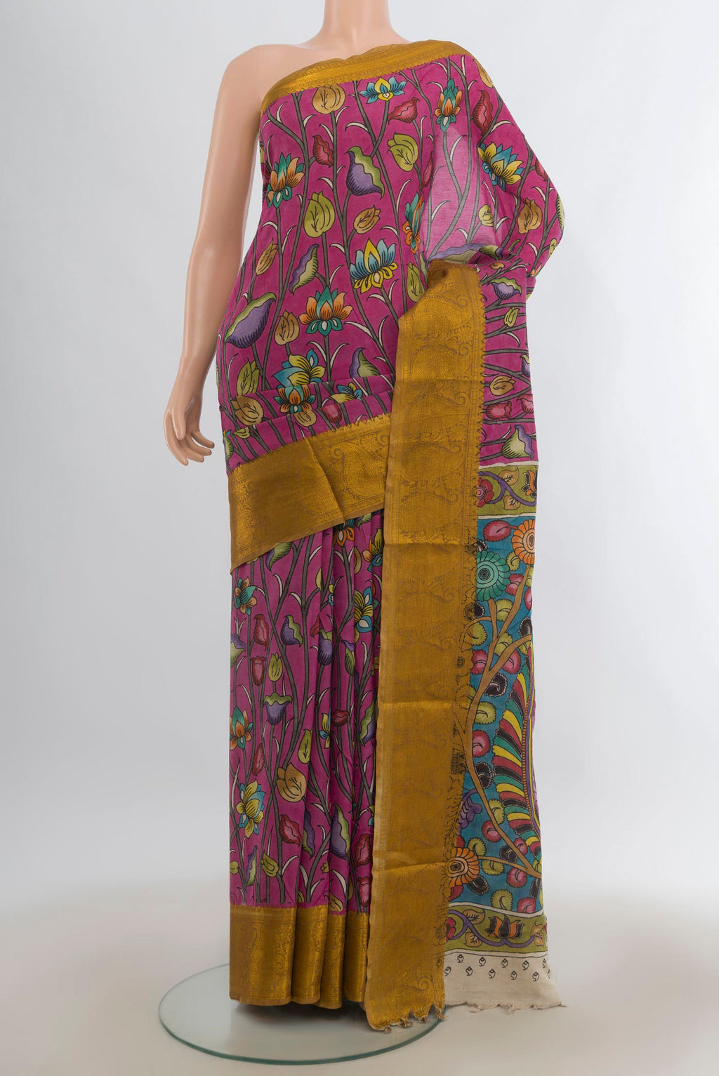 Pure Silk Pink kalamkari Saree with kalamkari Print on the body and Zari Border.  displayed on a mannequin